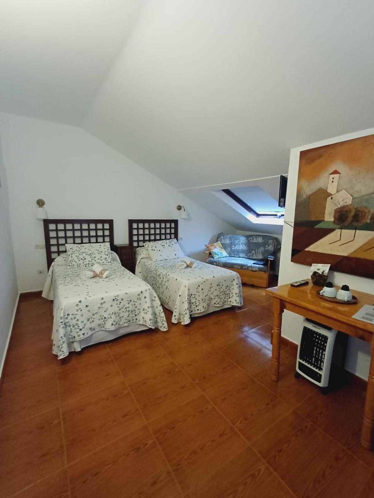 Hotel El Coterin Apartamentos Y Habitaciones อาเรนัส เด กาบราเลส ภายนอก รูปภาพ
